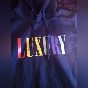 Dark blue "LUXURY" hoodie, Says M but fits as an XS or S